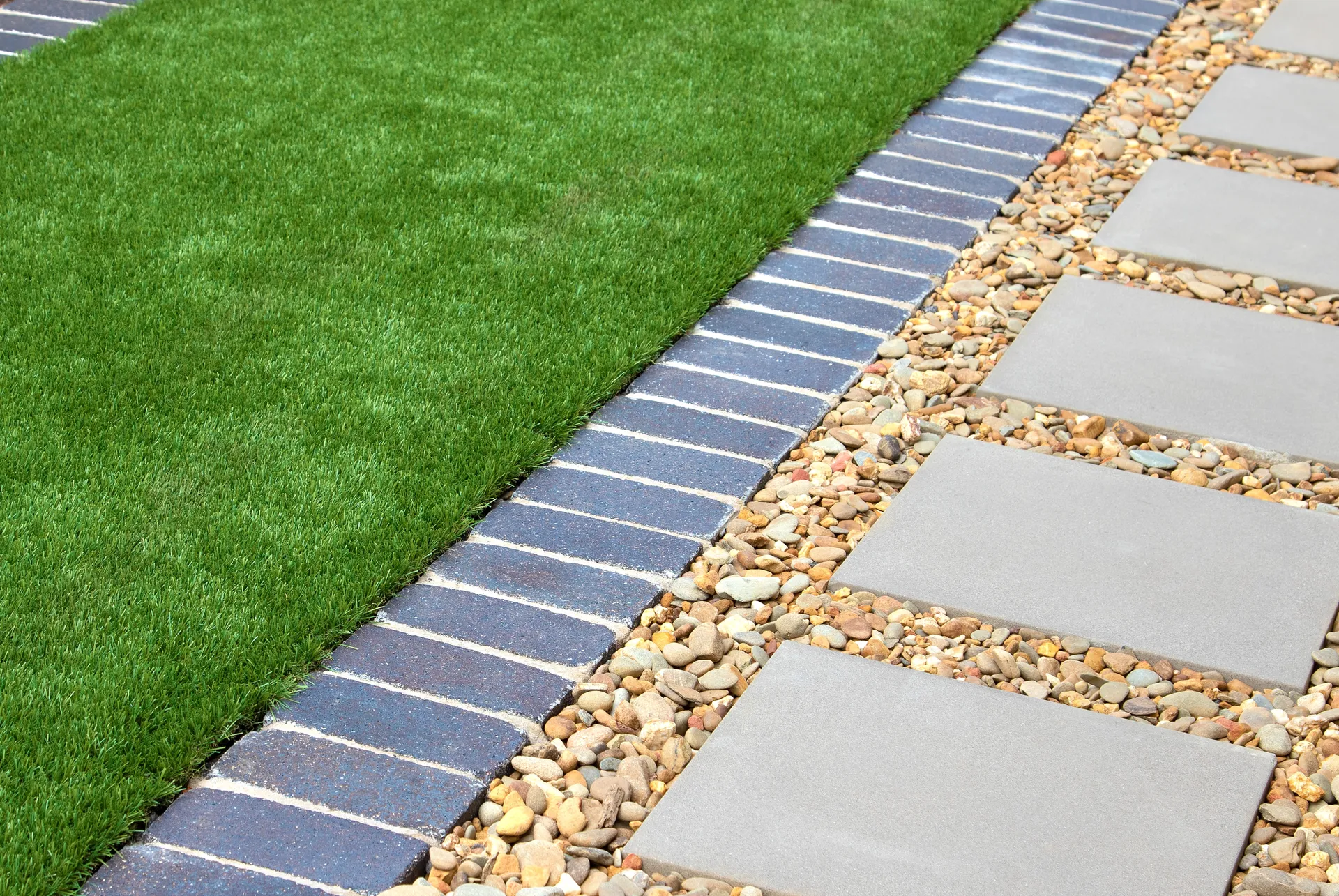 A landscaped Illawarra backyard with freshly laid artificial turf